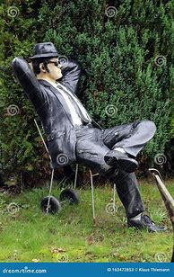 Image result for Lounging Man in Suit in Lawn Chair