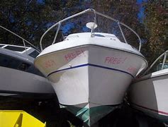 Image result for Bayliner 27 Cabin Cruiser