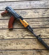 Image result for Suppressed AK-47