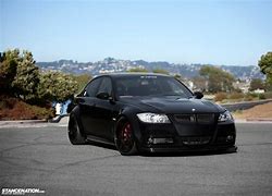 Image result for BMW E90 Blue Black Wheels