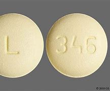 Image result for Round Yellow Pill with L On It