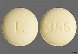 Image result for Round Yellow Pill with L On It