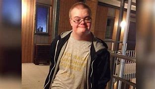 Image result for Down Syndrome Holding Gun