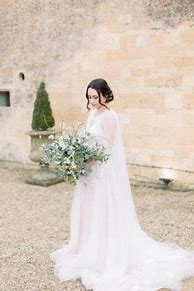 Image result for Winter Wedding Dresses with Capes