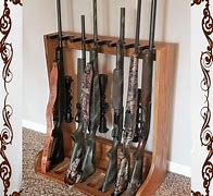 Image result for Wall Mounted Gun Rack Designs