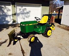 Image result for John Deere 318 Tiller Parts