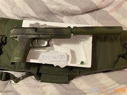 Image result for DC Wrapped MK23 Airsoft Gun