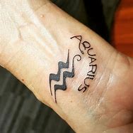 Image result for Aquarius Ring Finger Tattoo