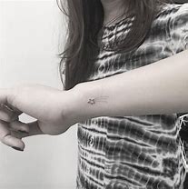 Image result for Small Star Tattoos On Wrist