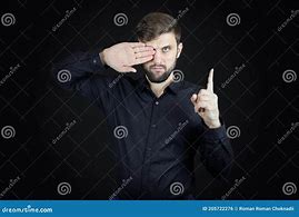 Image result for Man Black Shirt Hands Behind the Back