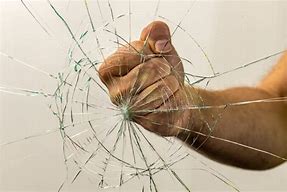 Image result for Fist Breaking Glass