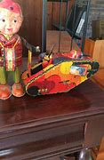 Image result for Tin Toy Saratoga