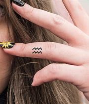 Image result for Aquarius Finger Tattoo