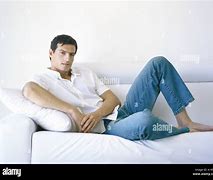 Image result for Man Lounging On Sofa