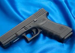 Image result for glock 9mm pistol