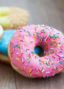 Image result for Sprinkled Donuts