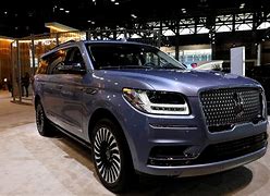 Image result for Nissan 8 Passenger SUV