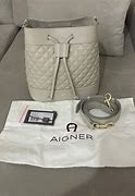 Image result for Tas Aigner