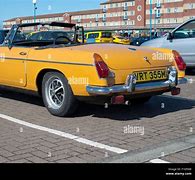 Image result for Mg Yellow Car