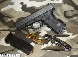 Image result for Glock 23 40 Cal