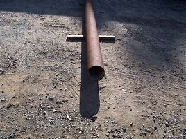 Image result for Cast Iron Pipe in Concrete Block Wall