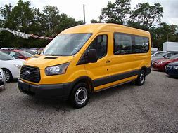 Image result for Yellow Transit Van