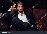 Image result for Man in a Suit Smoking