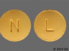 Image result for Round Yellow Pill with L On It