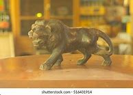 Image result for Lion Wood Art