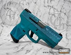 Image result for Taurus 9Mm Teal