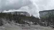 Steamboat Geyser in Yellowstone National Park bubbles and erupts