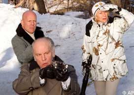 John Malkovich, foreground, Bruce Willis and Helen Mirren, right, are shown in a still from Red