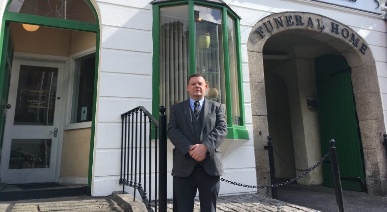 Gary Perry standing in front of Corrigan and Sons, Camden Street, Dublin