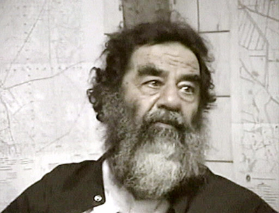 A picture of Saddam Hussein after U.S. troops captured him