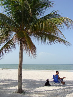 Jeff & Stella relax on Ft. Myers Beach.