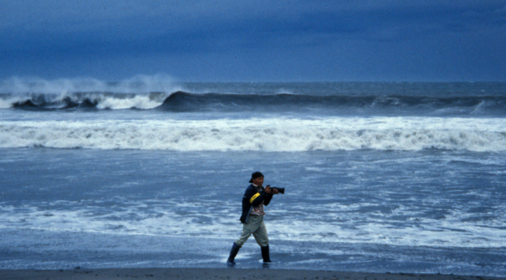 Photogropher on Kamakura beach after typhoon