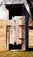 Lilac Texas cemetery outhouse