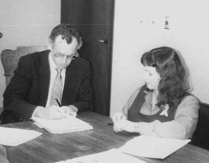 JoNell Haas signing paper to  title of Blano Courthouse land