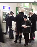 Lining up for euros at an ATM machine in Brussels